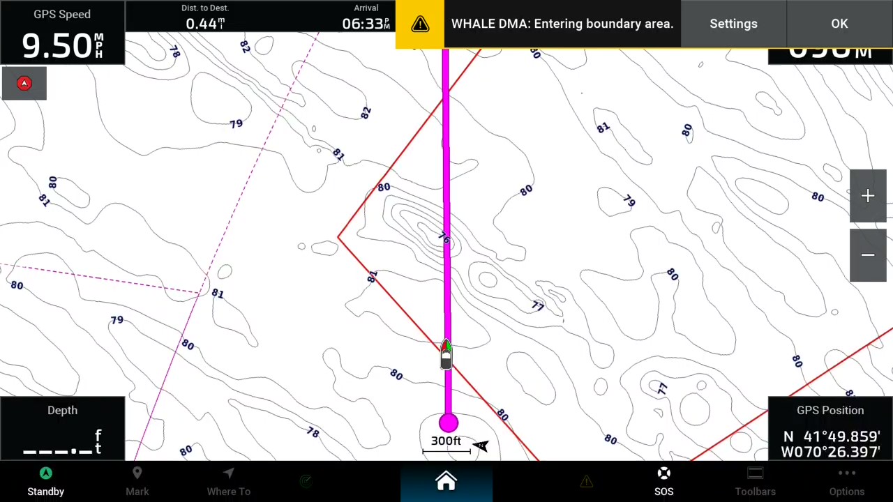 Alarm notification on chartplotter indicating entering boundary area.