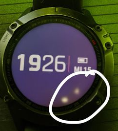 White Spots in Watch Face at 4 and 5 O'clock Positions