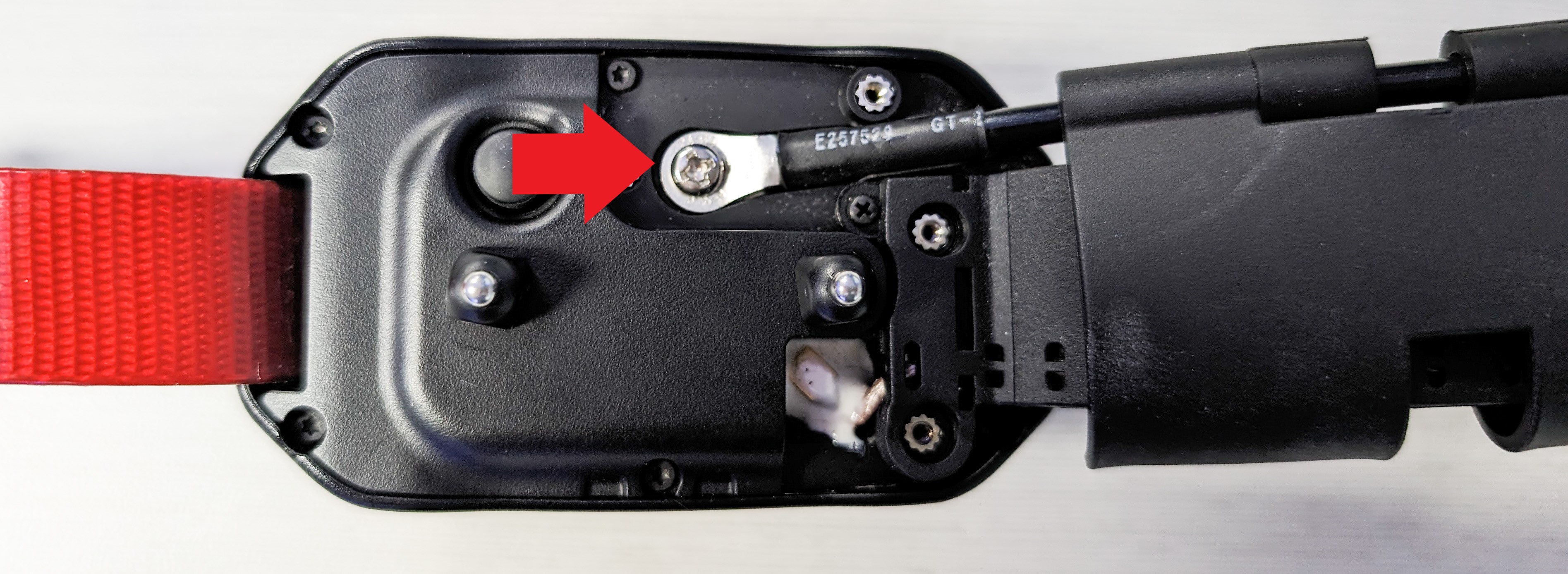 Rear of device pointing to screw that holds in VHF antenna.