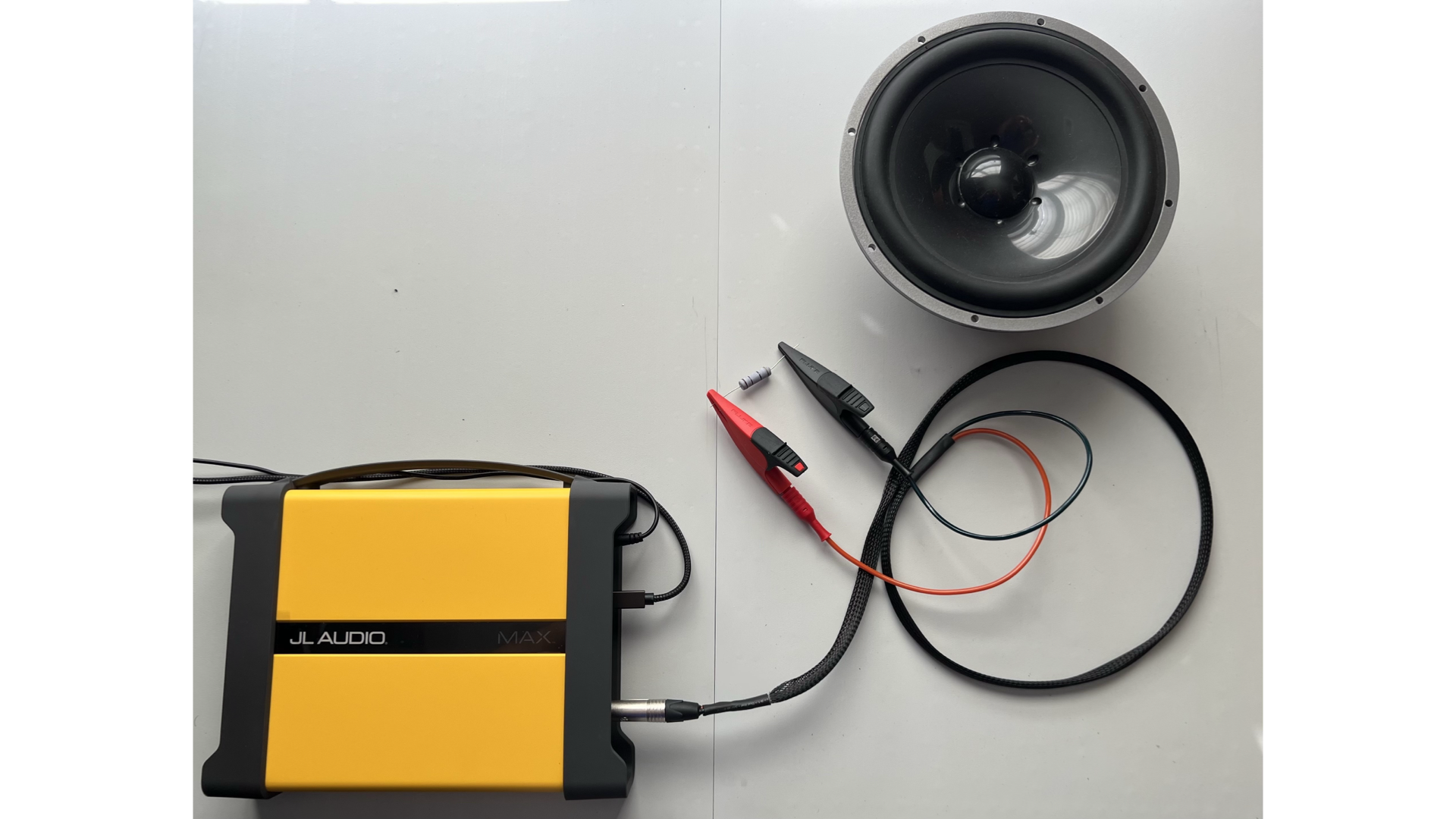JL Audio TRS probe alligator clips connected to 10 ohm resistor