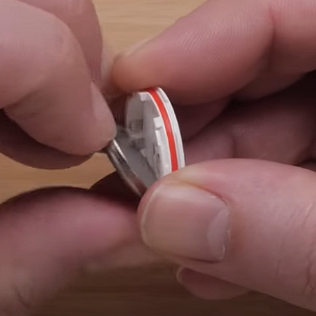 remote battery removed from case