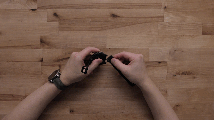 Pushing watch band into place GIF